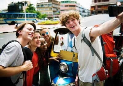 imgi_8_group-caucasian-tourists-taking-selfie-front-tuk-tuk_53876-78608