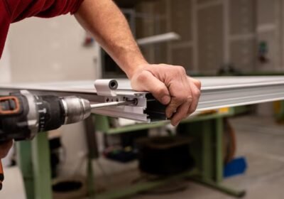 imgi_2_male-with-red-shirt-making-window-with-industrial-tools_181624-50175